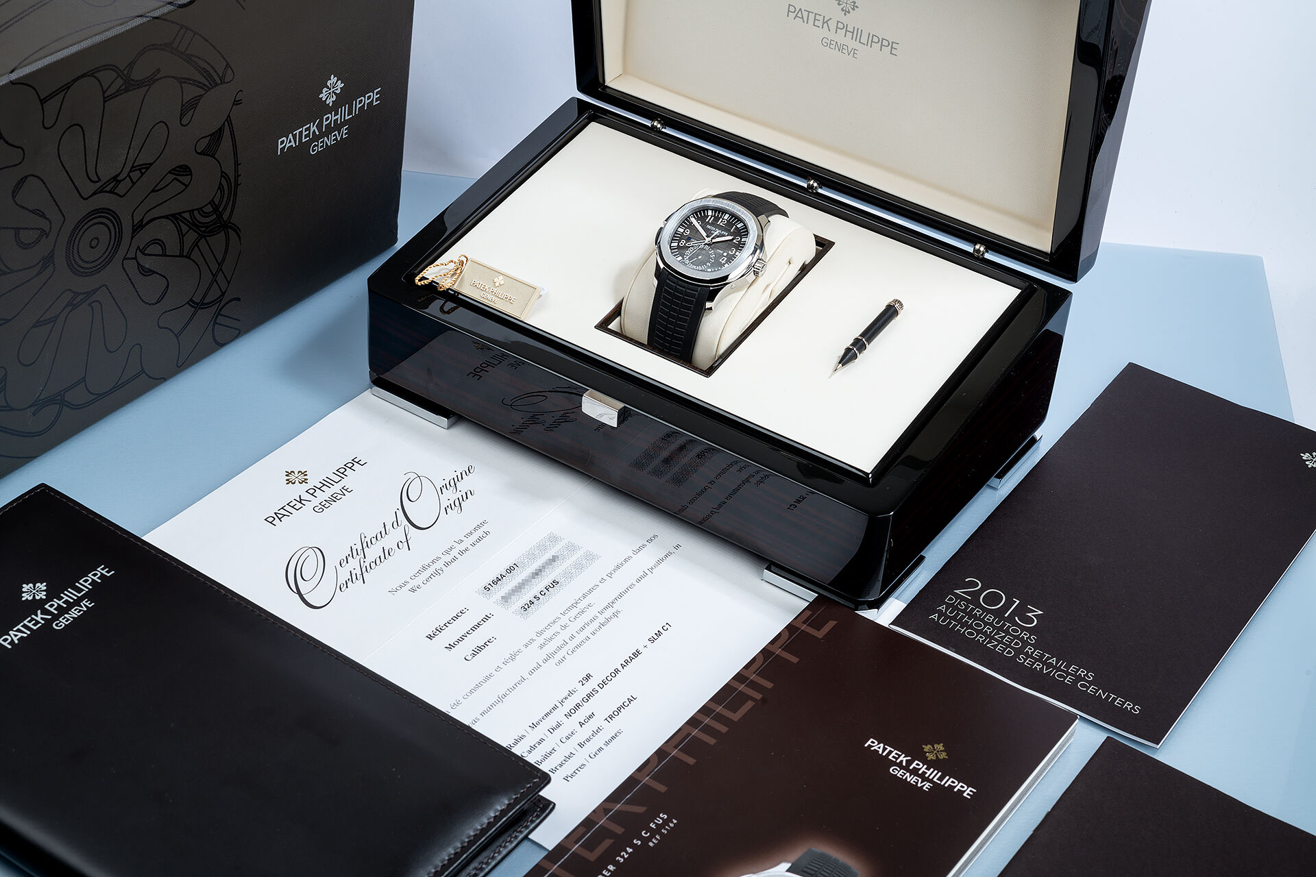 ref 5164A-001 | Box & Papers | Patek Philippe Aquanaut Travel Time