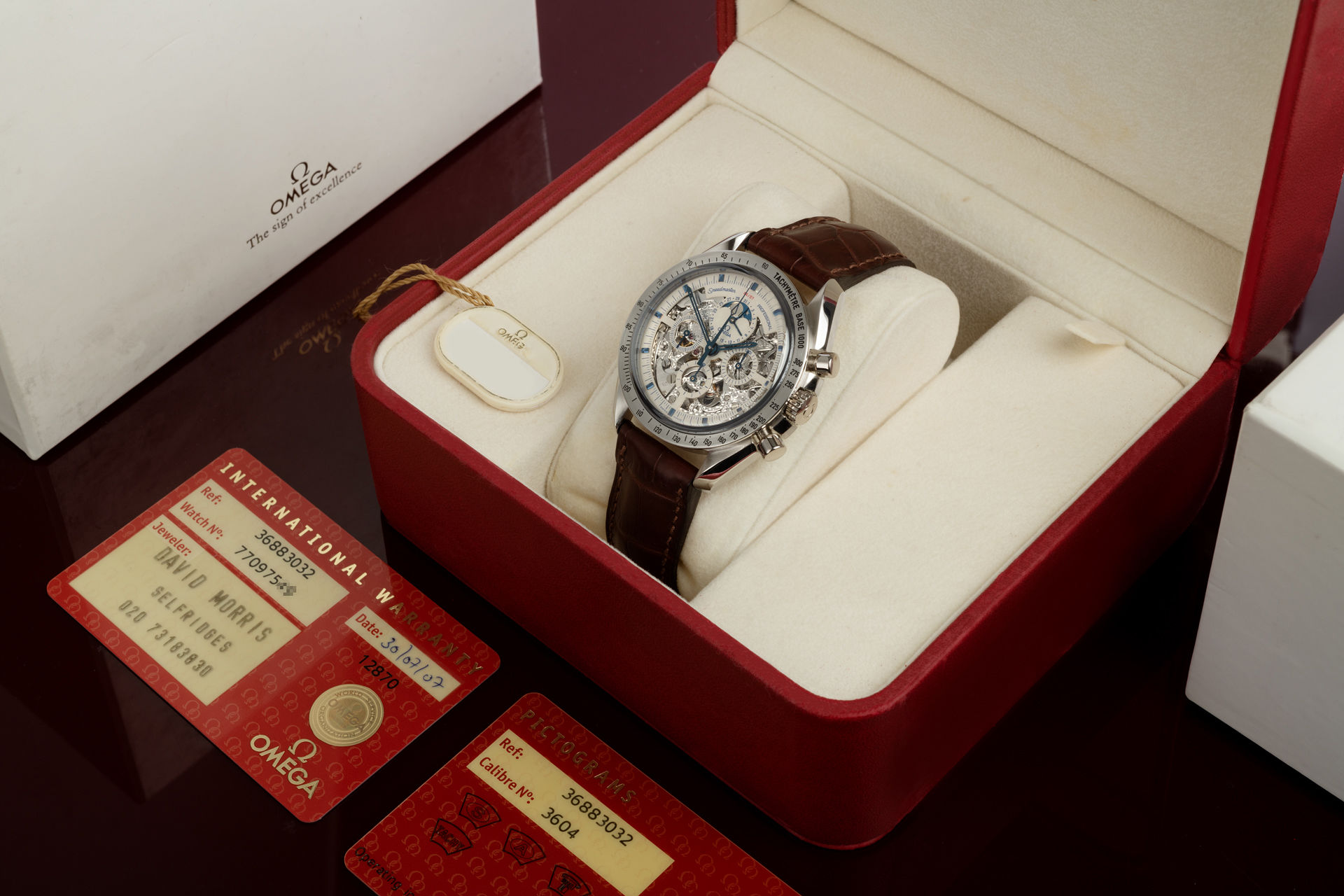 ref 145.0058 | 'Moonphase' Limited Edition Box & Papers  | Omega Speedmaster Platinum "One of 57"