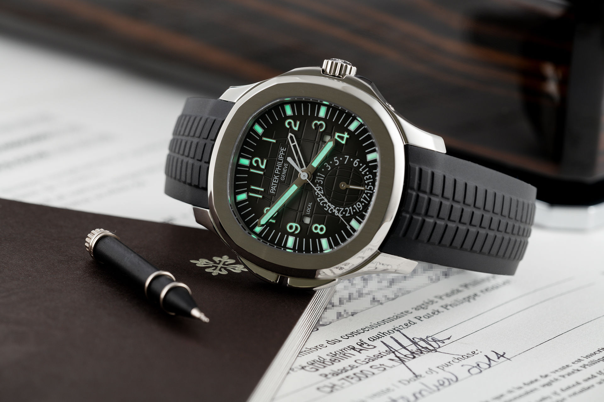 ref 5164A-001 | 'Under Patek Warranty' | Patek Philippe Aquanaut Travel Time