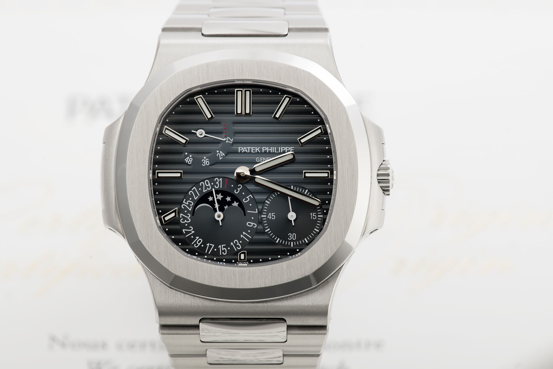 ref 5712/1A-001 | Box & Certificate | Patek Philippe Nautilus