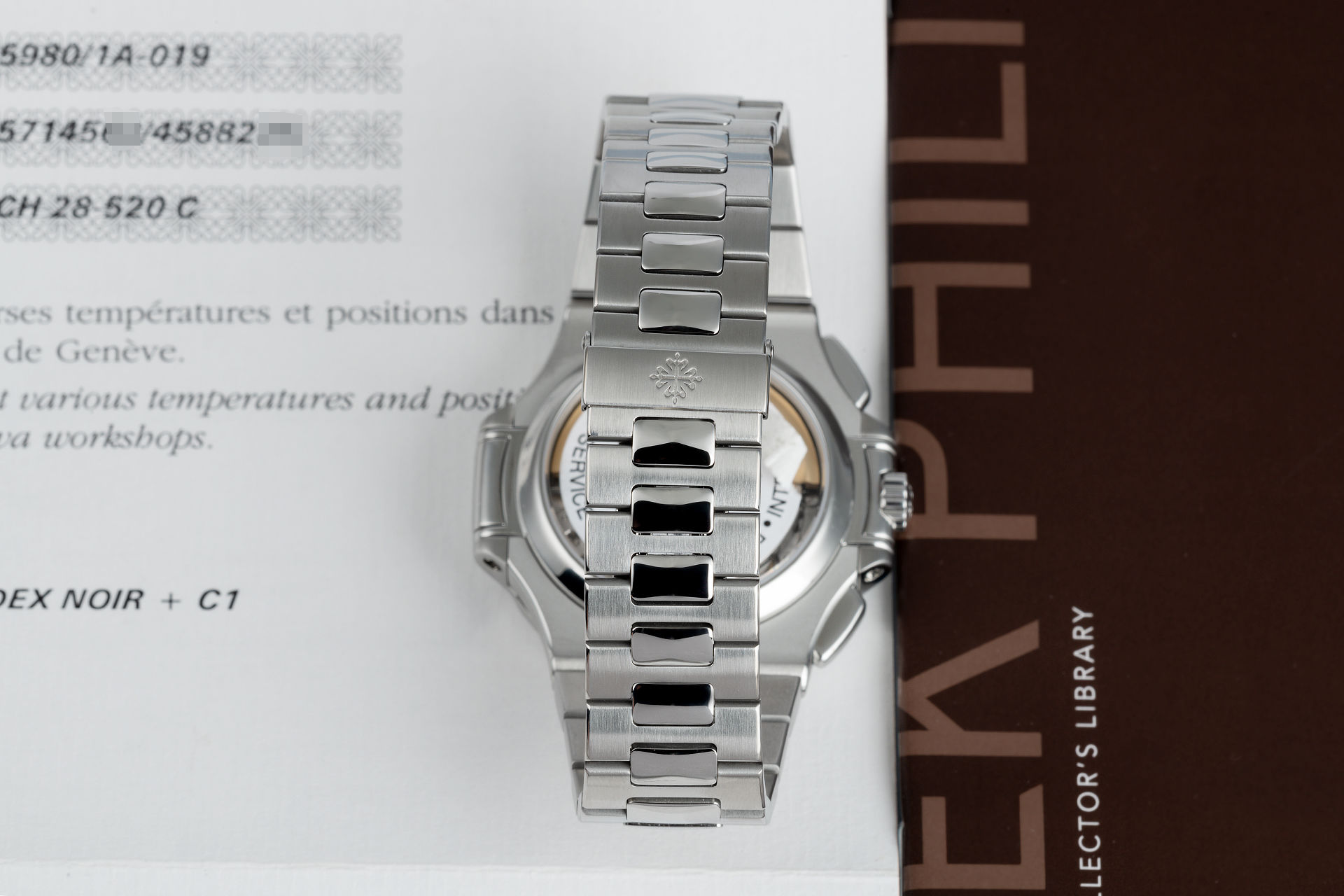 ref 5980/1A-019 | 'Full Set' Rare White Dial | Patek Philippe Nautilus Chronograph