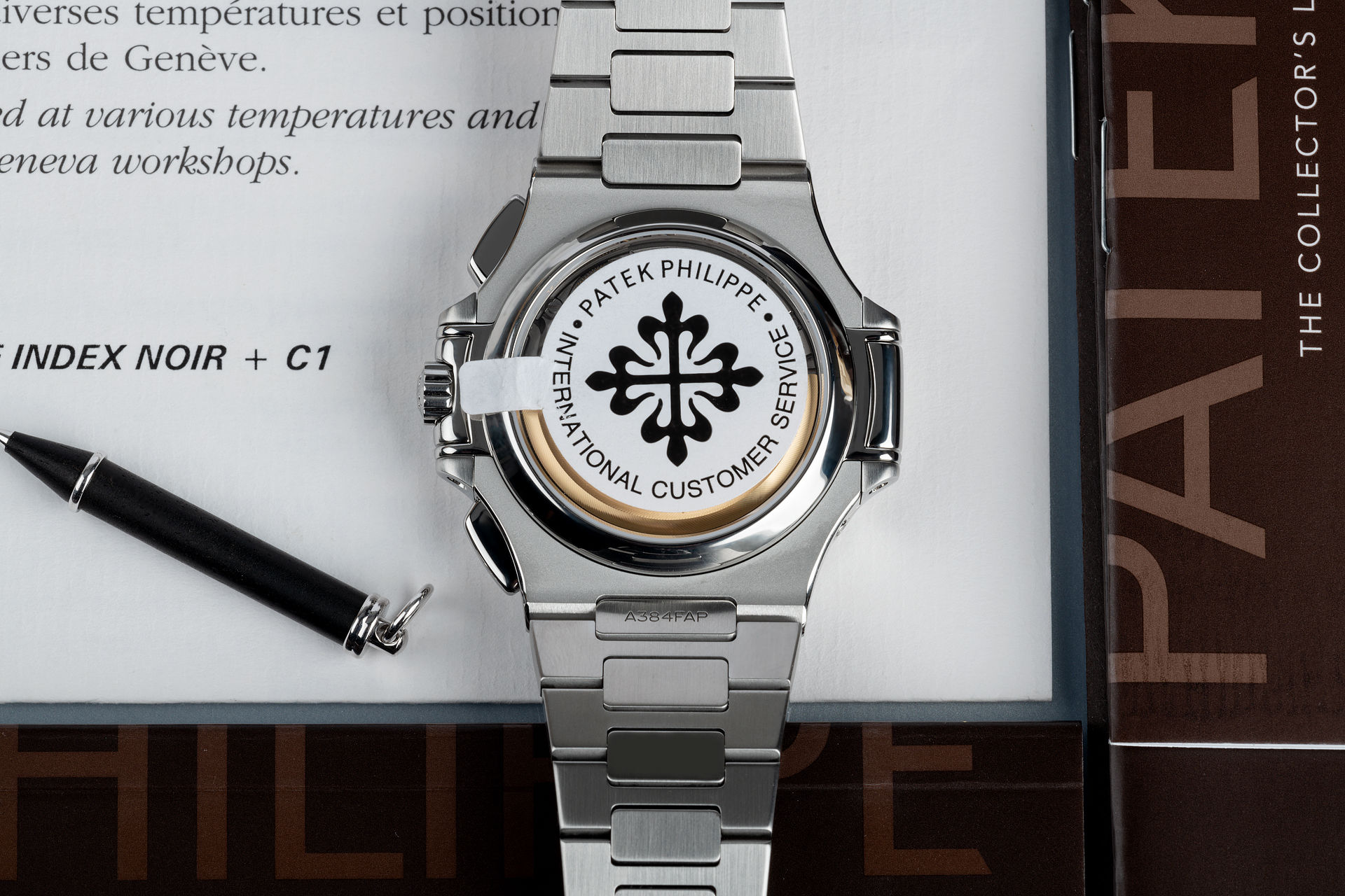 ref 5980/1A-019 | 'Full Set' Rare White Dial | Patek Philippe Nautilus Chronograph