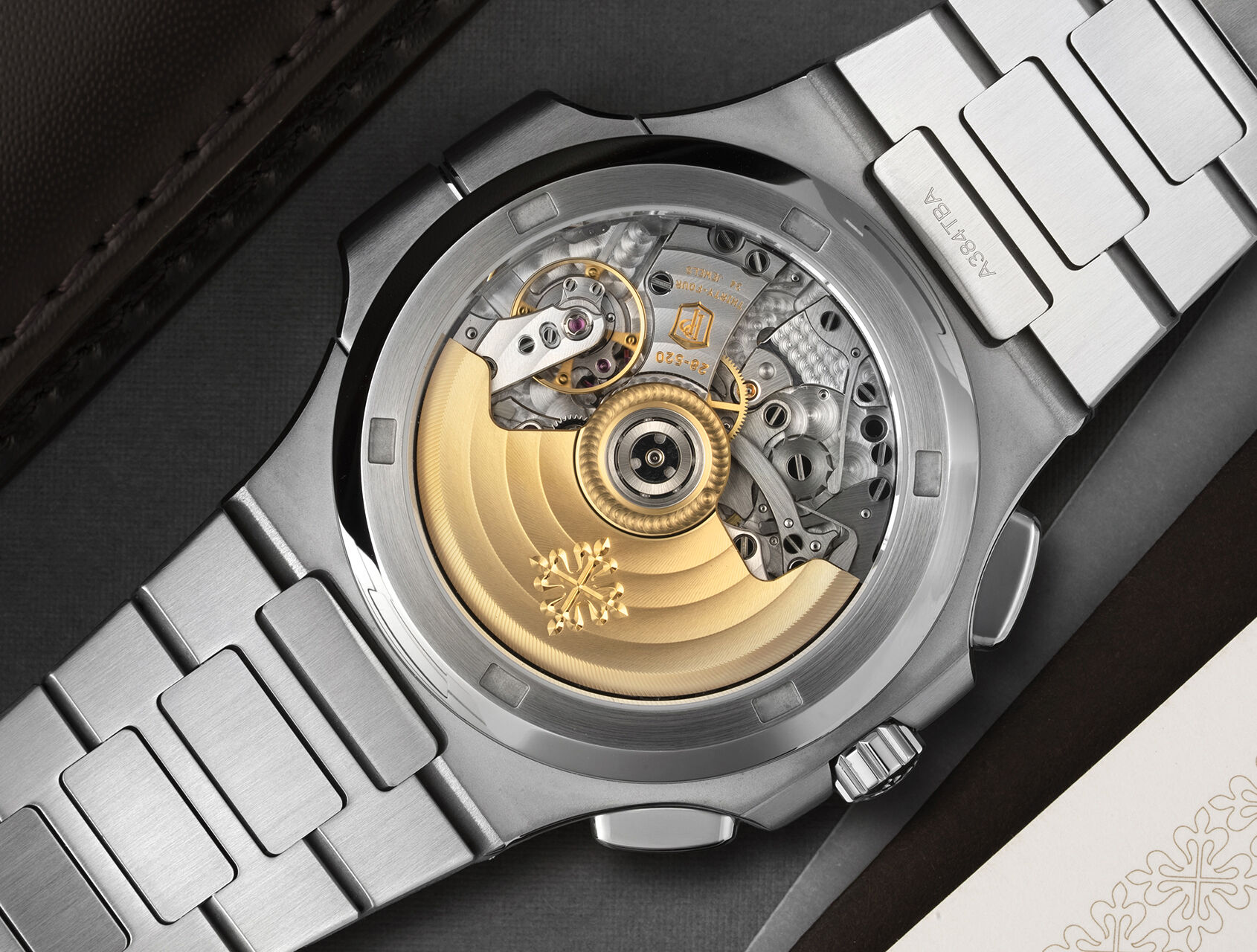 ref 5990/1A-011 | 5990/1A - Box & Certificate | Patek Philippe Nautilus Travel Time Chronograph