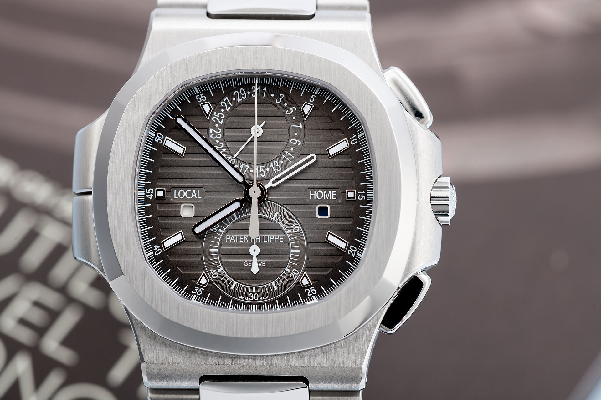 ref 5990/1A-001 | Box & Papers | Patek Philippe Nautilus Travel Time Chronograph