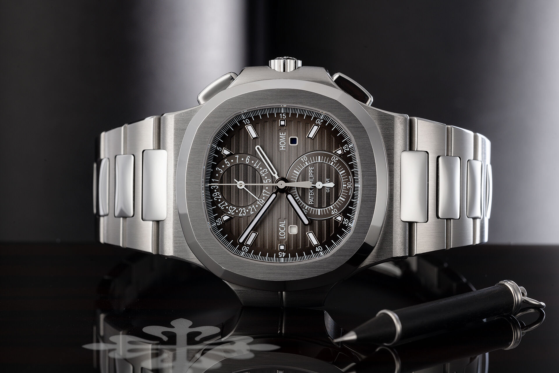 ref 5990/1A-001 | Box & Papers | Patek Philippe Nautilus Travel Time Chronograph