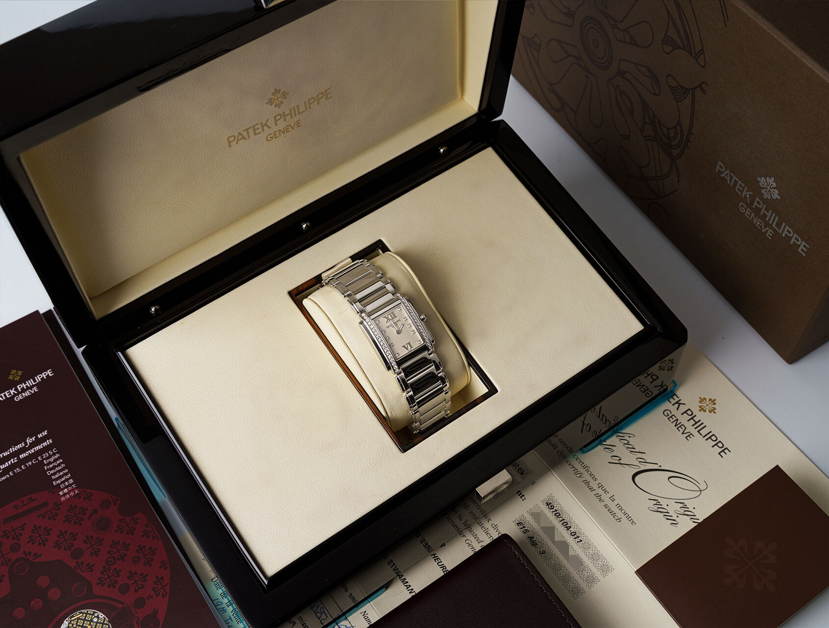 ref 4910/10A-011 | 4910/10A - Box & Papers | Patek Philippe Twenty-4