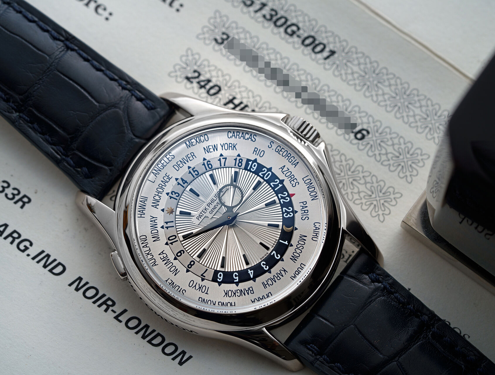 ref 5130G-001 | 5130G - White Gold | Patek Philippe World Time