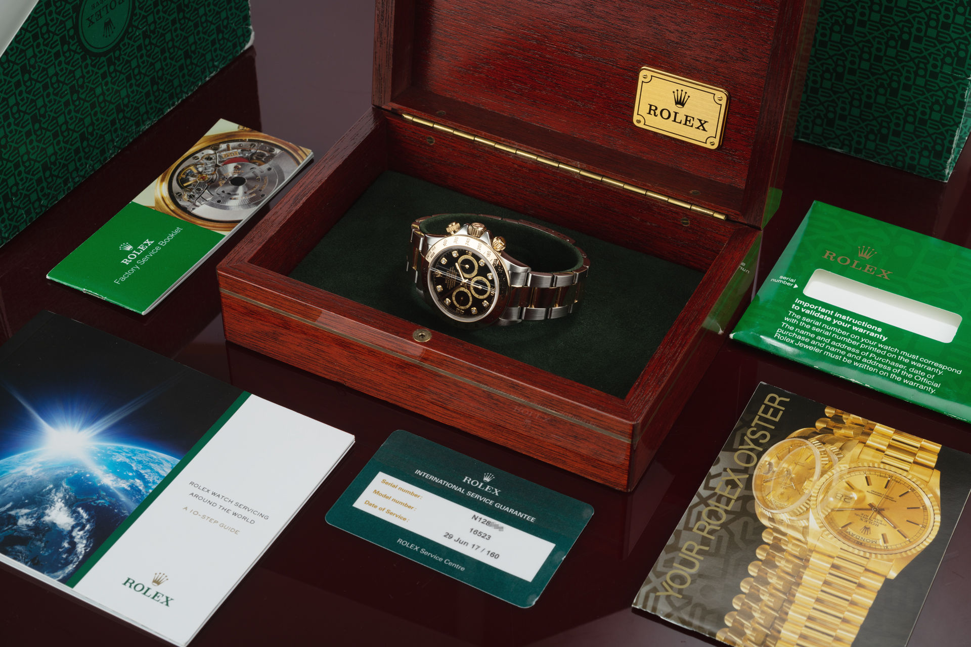 ref 16523 | Gold & Steel 'Upside Down Six' Rolex Warranty | Rolex Cosmograph Daytona