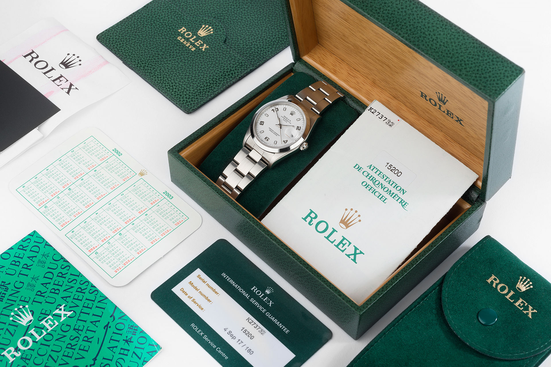 ref 15200 | 34mm 'Rolex Warranty' | Rolex Date