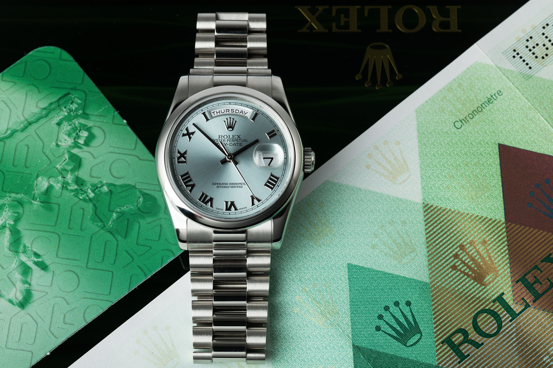 Платина реклама. Rolex Day Date President Platina. Rolex Day-Date 40 Dark Rhodium Dial. Rolex Day Date Ice Blue. Rolex Day Date Platinum Color.